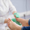 What problems do podiatrists treat?